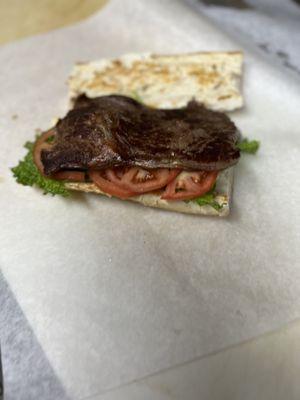 Ribeye steak on French bread