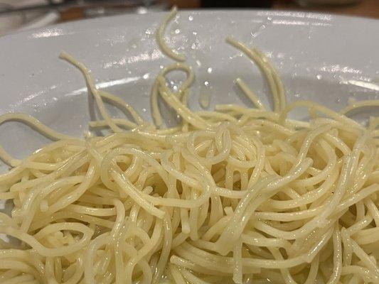 Spaghetti with butter from the kids menu. She wolfed down nearly half of it before I could get a photo.