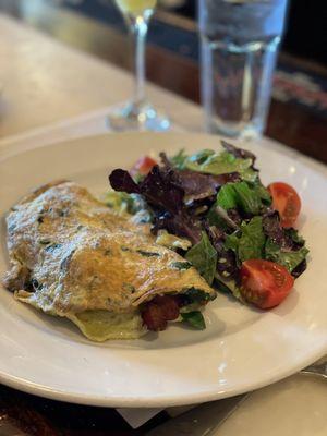 Mushroom, spinach and bacon omelet with side salad