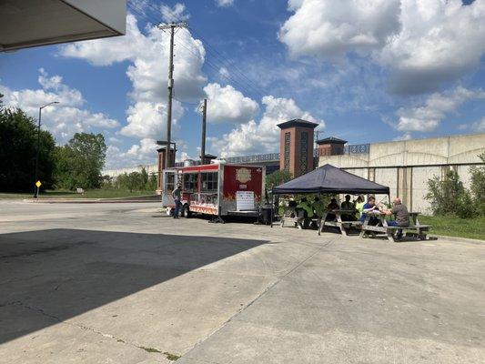 Limited seating available-- the truck is on the far side of the gas station