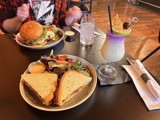 BLTA with side salad, and a tropical pineapple mocktail