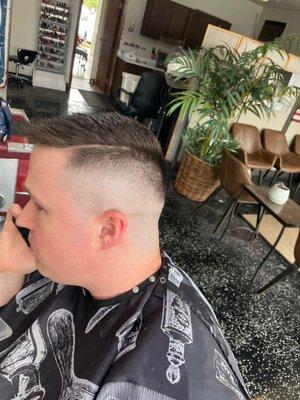 Skin fade and hard part.