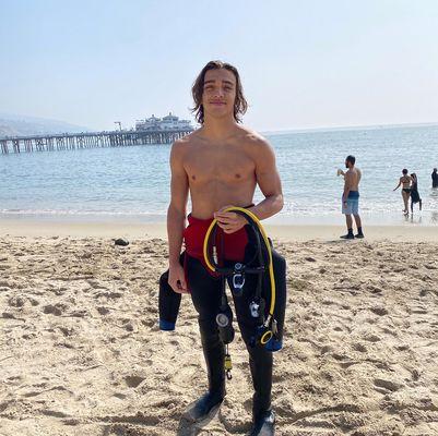 Beach cleanup volunteer Malibu pier.