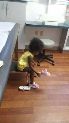 Babygirl changing shoes