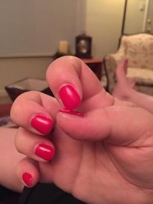 My gel manicure that started peeling after 3 days. The paint on 4 of my nails peeled off completely a week later... Should last 3 weeks!