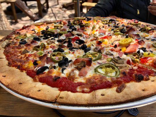 16" pizza w/ cheese, ham, black olives, mushrooms, bell peppers, onion & jalapeños. Crust tasted like cardboard, ruined pie.