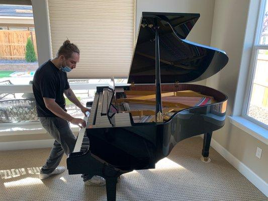 Once the piano was safely moved, our talented team lead plays "Let it be". The clients were surprised and happy it was still in tune!