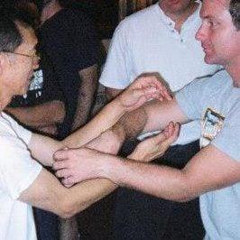 Sifu Ben Der and Sifu Jonathan Petree training via Chi Sao. Ben Der was a student in Ip Man's school & friend of Bruce Lee.