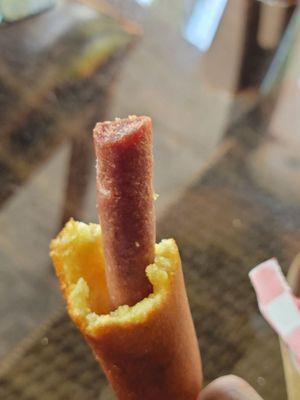 Corn dog aka unflavored battered slim jim. You can hurt someone with this.