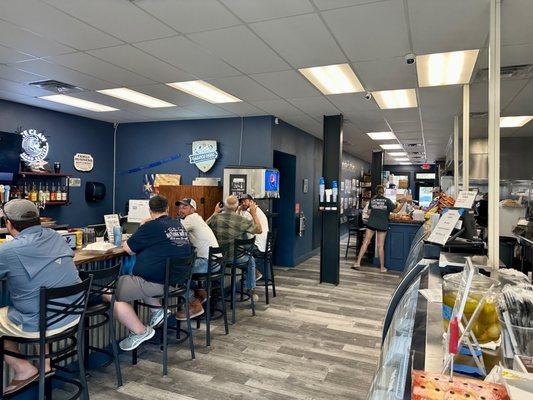 Plenty of seating inside and at the bar which serves local craft beer on tap.