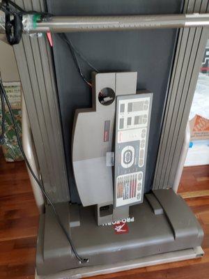 Treadmill, totally trashed.The console was totally ripped off .