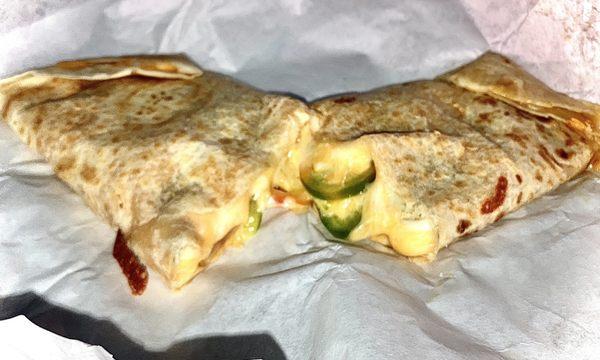 Cheese Quesadilla the size of a burrito! W/ Jalapeños by request, grilled up hot & toasty.