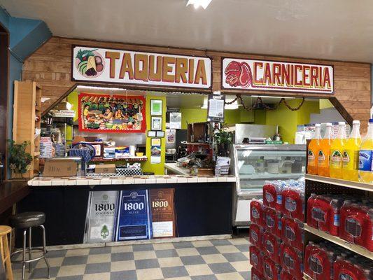 Inside the market is this taqueria and "deli" but really there are only burgers and dogs