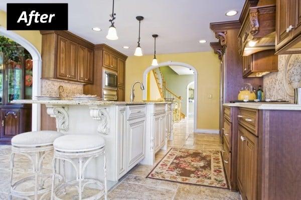 White painted island with Cherry cabinets from Bishop Cabinetry