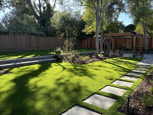 New turf and retaining wall