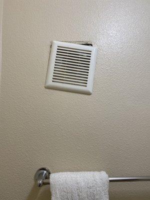 Dirty and broken vent in bathroom