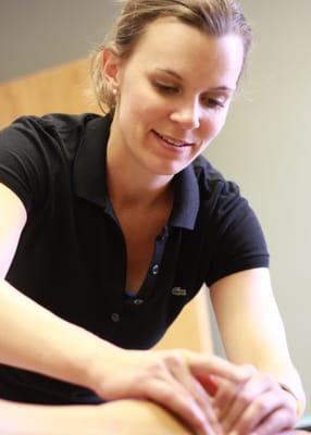 Dr Lisa doing muscle work at her Boulder office.