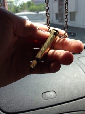 Keeping my new pendant on my car's rear view mirror. A great little way to remember my late grandfather by.