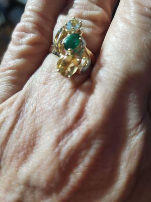 Me-Aquamarine, Him-yellow citrine, Anniversary-Emerald. Yellow+blue=green