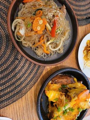 Jap chae and fries with cheese and kimchi