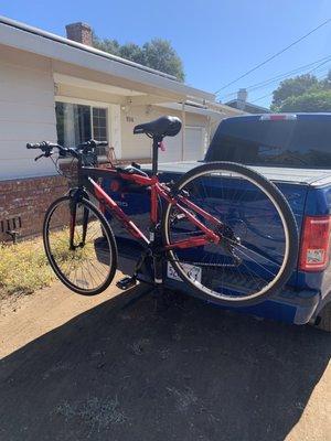 Bike on rack behind truck