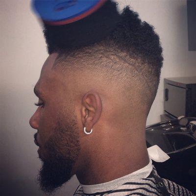 Twist sponge styled and bald fade