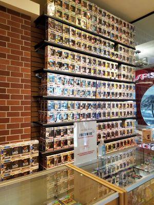 Classic Materials Sports & Collectibles Stonestown- LOTS of Pop figures displayed along the long wall