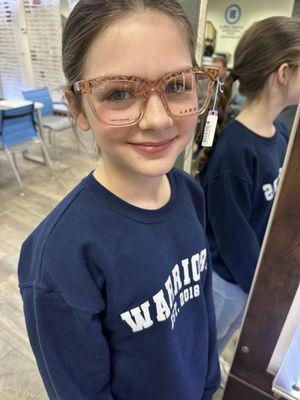 My daughter post-appointment trying on some specs!