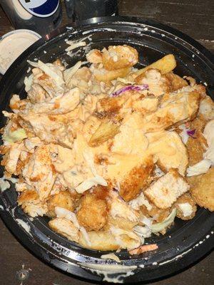 Sassy Mac Bowl has fried, taters, Mac n cheese, pickles, coleslaw, chicken and sauce. A true taste of heaven