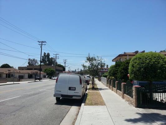 Facing south on New Ave. Street light in the distance is Garvey Ave.