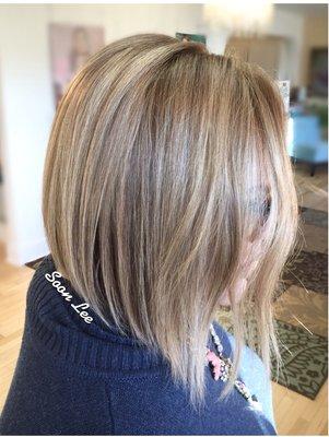 Cool blonde hair color and bob haircut by Soon Lee