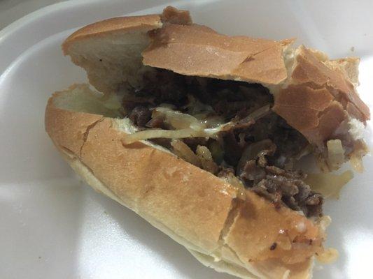 Philly steak and cheese with grilled onion... so much cheese and tender meat. I'm in love