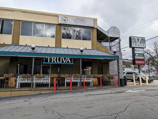 Outside. Storefront. Covered patio.