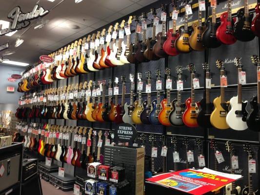 Our fantastic electric guitar wall.