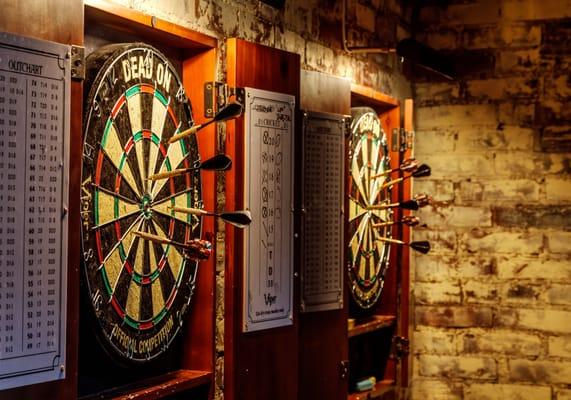 Darts...next to the darts a shelf full of games (150 games!)