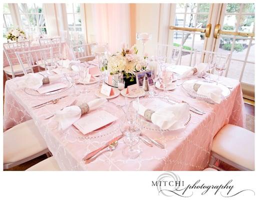 Mimi & Co linens
Square table - White LUXE overlays over blush Dupioni linens.  BEAUTIFUL linens.