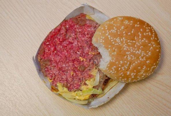 Raw meat in my quarter pounder