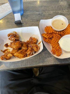 Boneless wings & sweet potato fries with sweet glaze