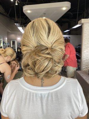 Bridal updo - messy low bun by Francesca