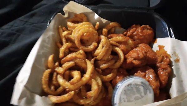 YUMMY!  Buffalo wings with curly fries and ranch dressing!