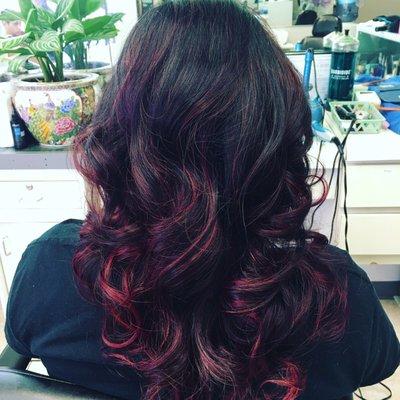 Ombré highlight in magenta and red with dark violent roots