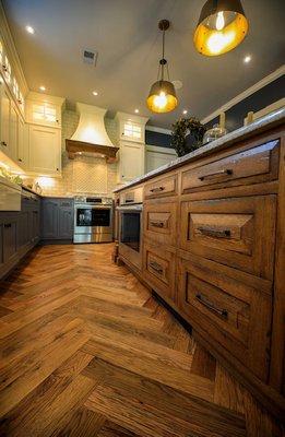 This herringbone flooring comes from our Racehorse Oak Collection.