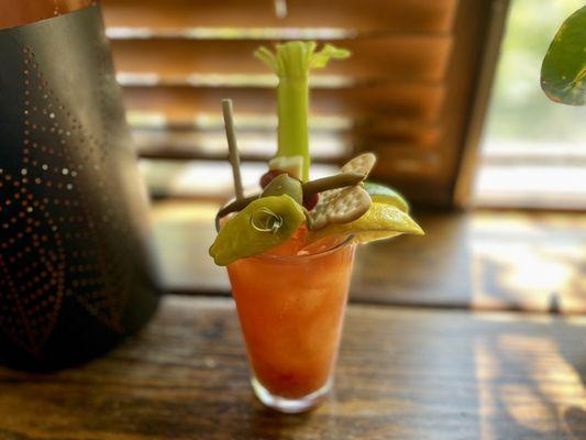 "Settlers Inn Bloody Mary" (blue cheese olives, alpine beef stick, aged cheddar, dilly beans, pepperoncini, celery)