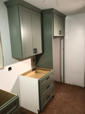 Light green shaker kitchen cabinets