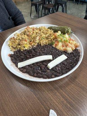 Machaca and eggs, served with beans