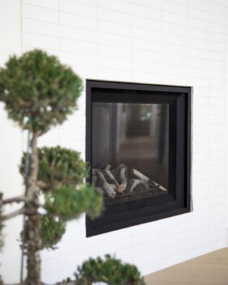 design by LOUhome ; fireplace by CORE