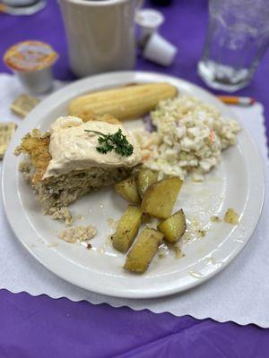 Fish pudding, potatoes, cole slaw, and corm sticks