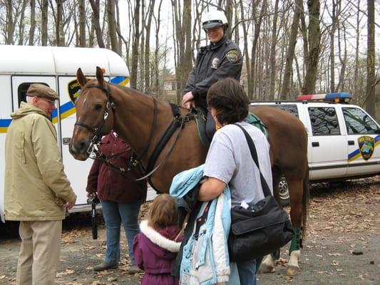 Visitors admiring the horse & asking the officer questions ~ a fine example for children!