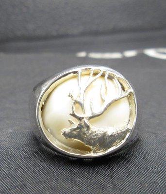 Elk tooth in silver ring