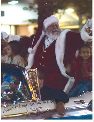 You know a chiropractor MUST be great when Santa autographs a photo to thank him!